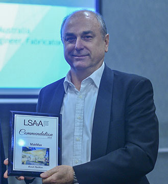 Mike Lester accepting an Award for the Bondi Pavilion in 2018